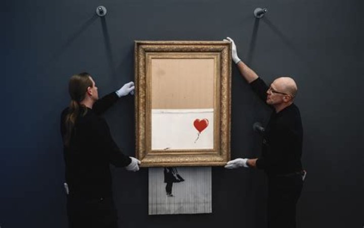 Banksy Painting Shreds Itself Immediately After Being Sold For $1.4 Million